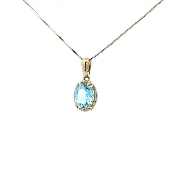 Mặt dây chuyền vàng cao cấp gắn topaz xanh