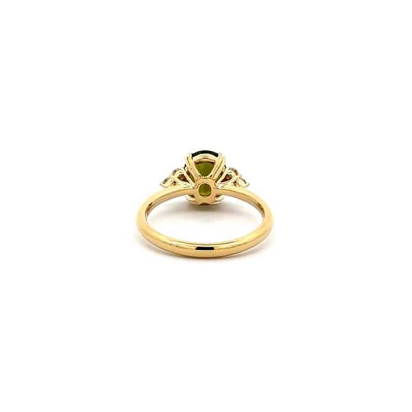 Nhẫn vàng với đá tourmaline xanh và kim cương