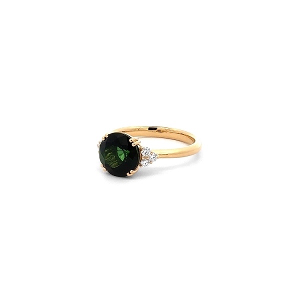 Nhẫn vàng với đá tourmaline xanh và kim cương