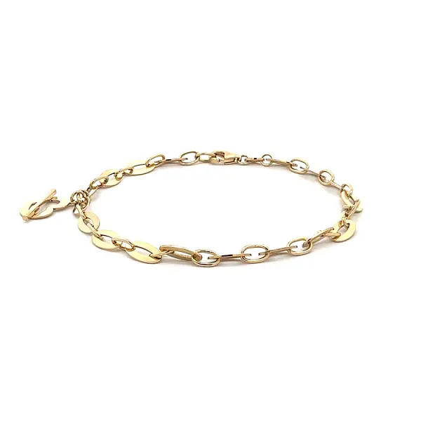 Vòng tay vàng có mặt dây chuyền hình trái tim