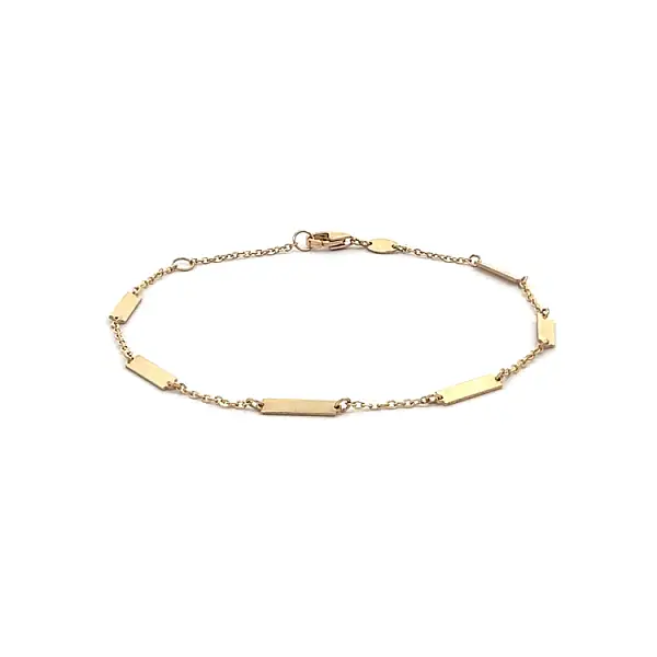 Vòng tay vàng có tấm trang trí