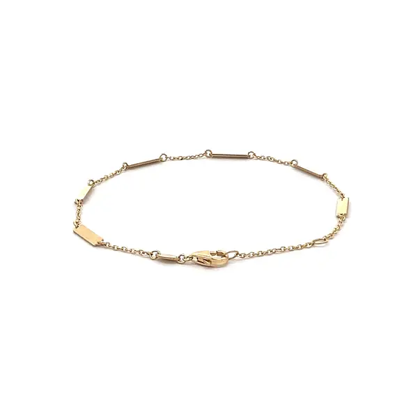 Vòng tay vàng có tấm trang trí