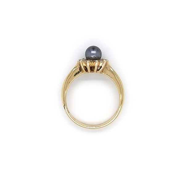 Nhẫn vàng đính ngọc trai đen và đá zircon