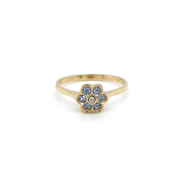Nhẫn vàng hình hoa với đá topaz xanh