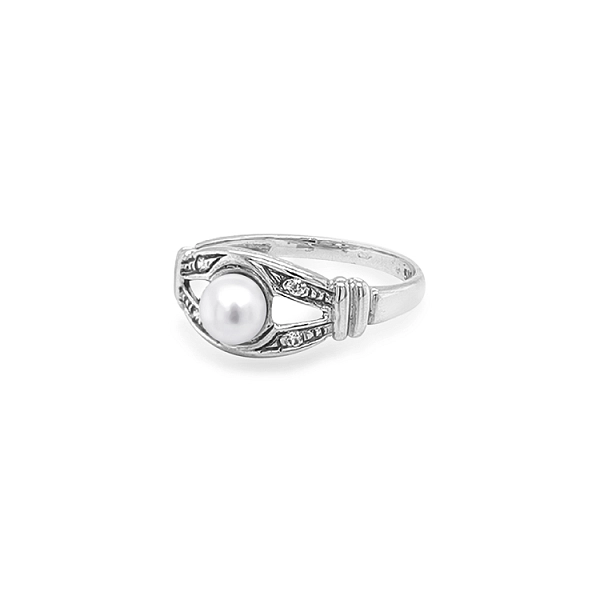 Nhẫn vàng đính ngọc trai và đá zircon