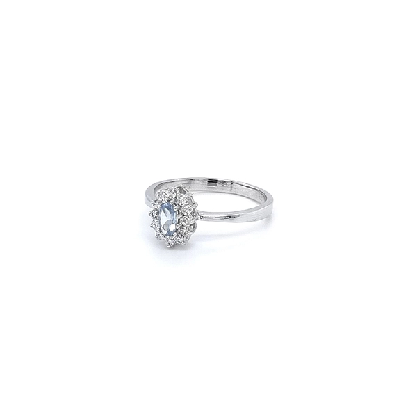 Nhẫn với đá Topaz trắng và vàng trắng