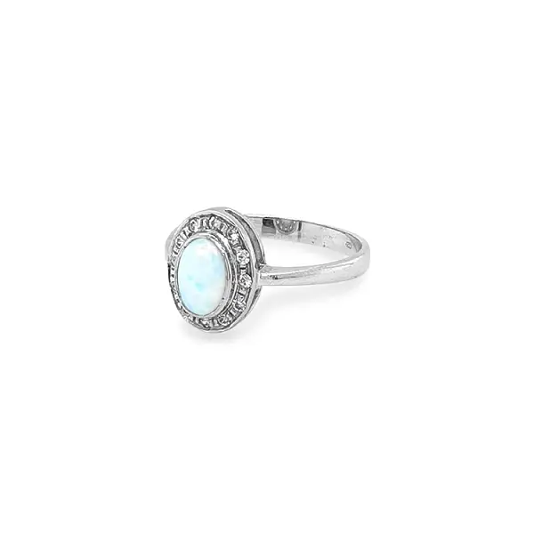 Nhẫn vàng đính ngọc opal và zircon