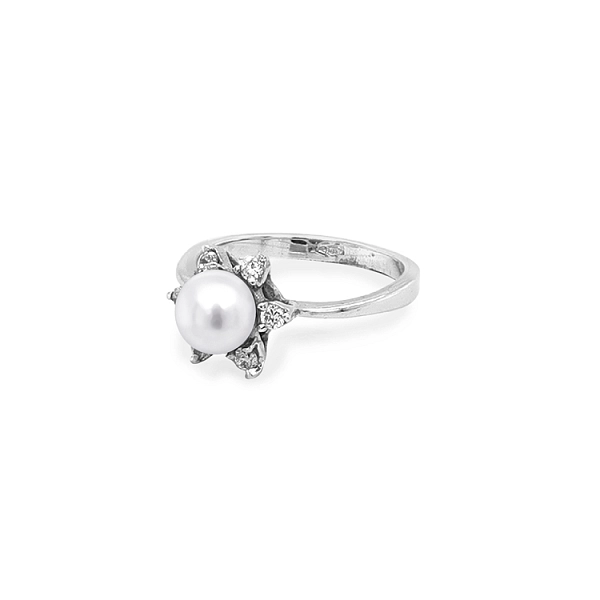 Nhẫn vàng đính ngọc trai và đá zircon