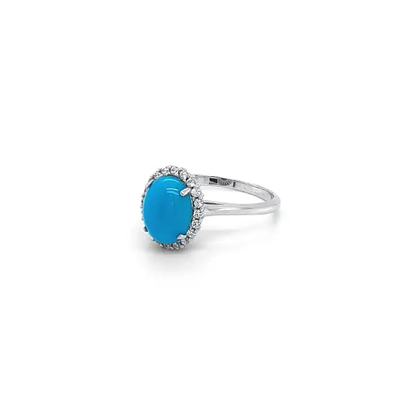 Nhẫn với đá turquoise từ vàng trắng