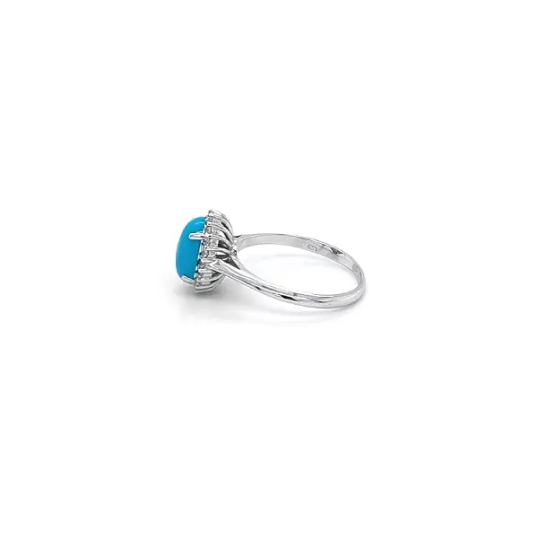Nhẫn với đá turquoise từ vàng trắng