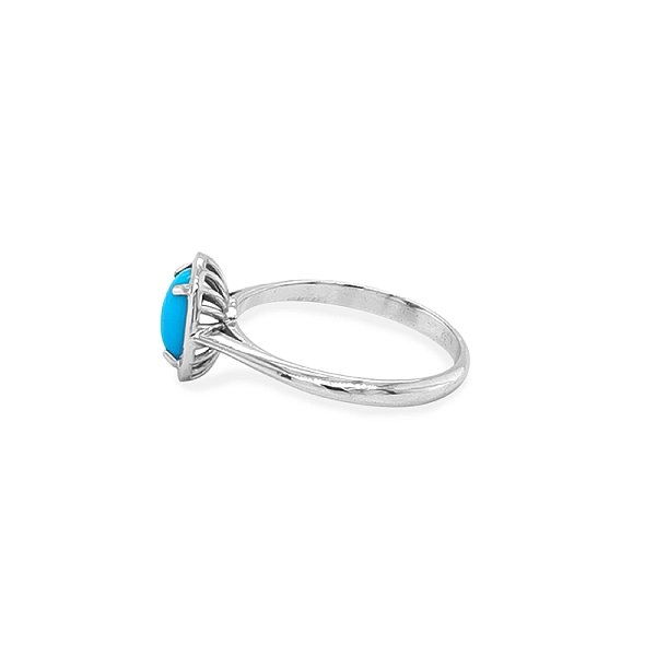 Nhẫn với đá turquoise từ vàng trắng