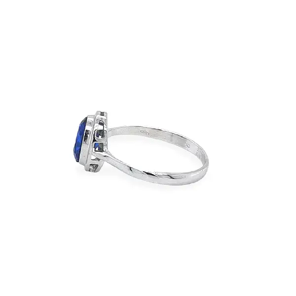 Nhẫn vàng đính đá zircon xanh
