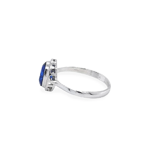 Nhẫn vàng đính đá zircon xanh