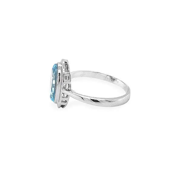 Nhẫn vàng đính đá zircon xanh