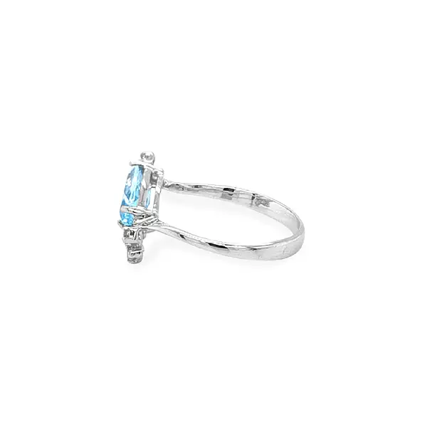 Nhẫn vàng đính đá zircon xanh