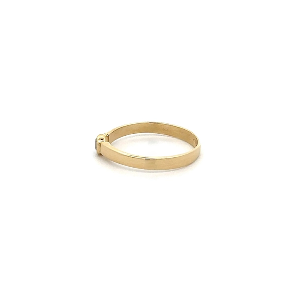 Nhẫn răng zircon vàng