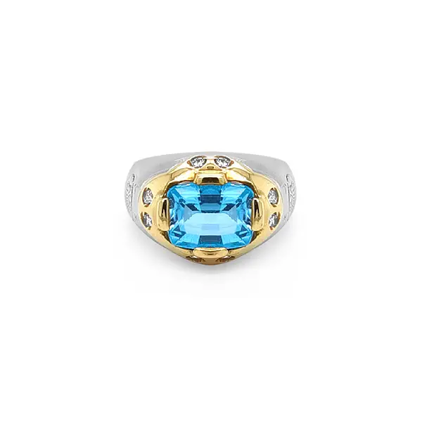 Nhẫn vàng đính đá xanh