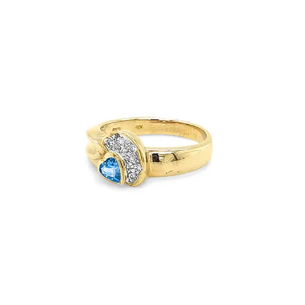 Nhẫn vàng cao cấp gắn topaz xanh hình trái tim và zircon