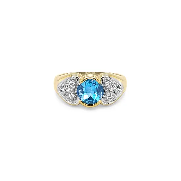 Nhẫn vàng cao cấp gắn topaz xanh và zircon