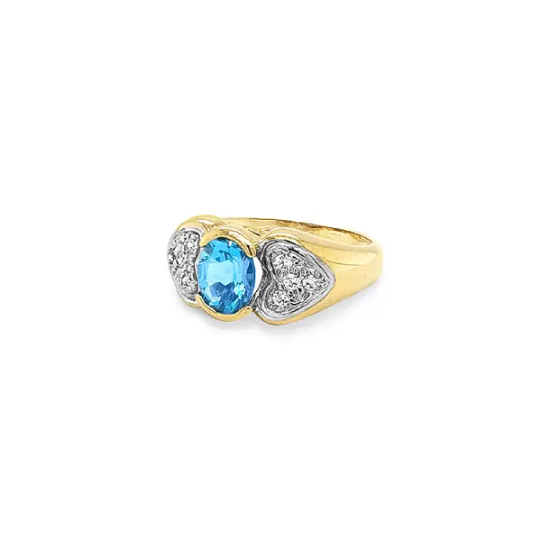 Nhẫn vàng cao cấp gắn topaz xanh và zircon