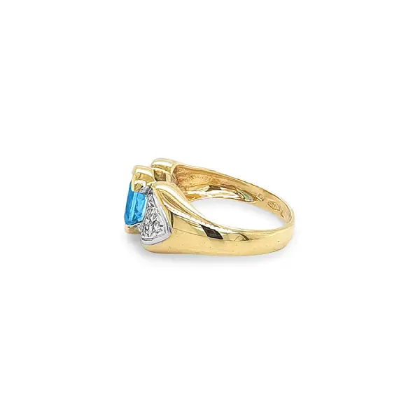 Nhẫn vàng cao cấp gắn topaz xanh và zircon