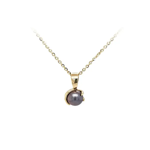 Mặt dây chuyền vàng đính ngọc trai đen