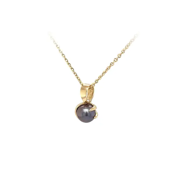 Mặt dây chuyền vàng đính ngọc trai đen