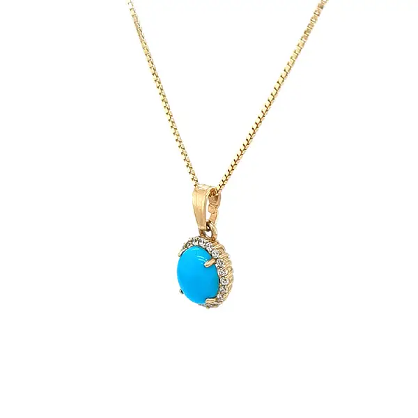 Mặt dây chuyền vàng đính ngọc lam và zircon