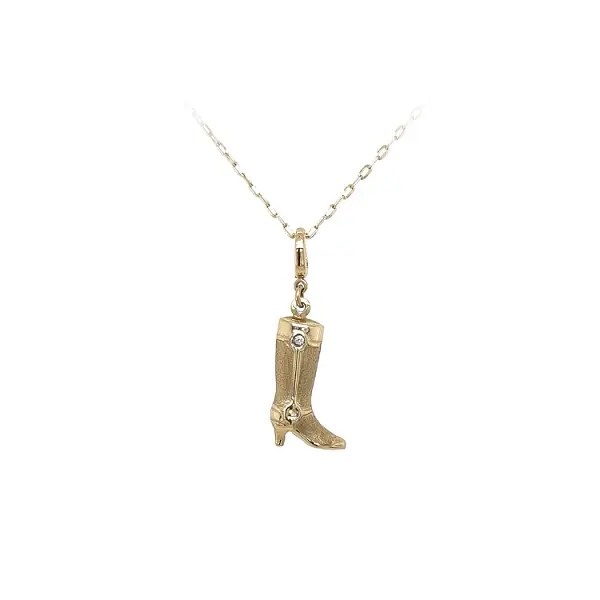 Mặt dây chuyền vàng hình Cossack đính đá zircon