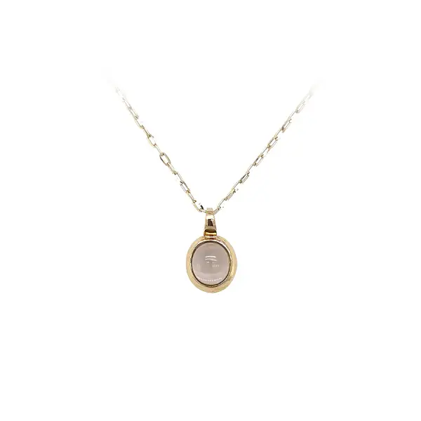 Mặt dây chuyền vàng với đá nâu