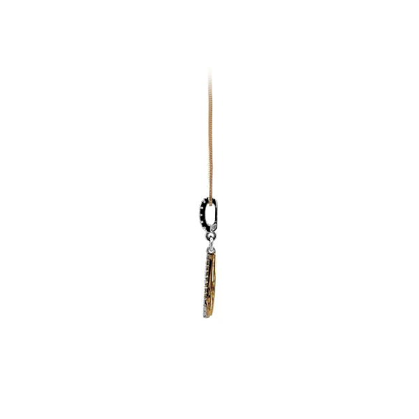 Mặt dây chuyền làm từ vàng kết hợp với zircon