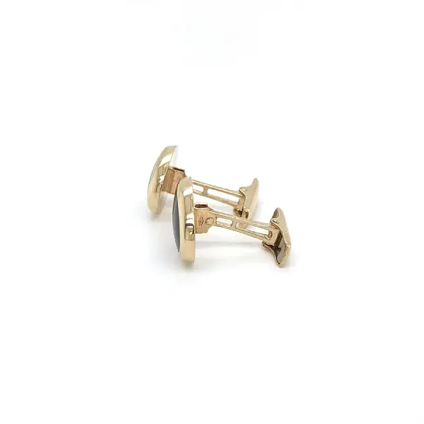 Khuy măng sét vàng với đá onyx