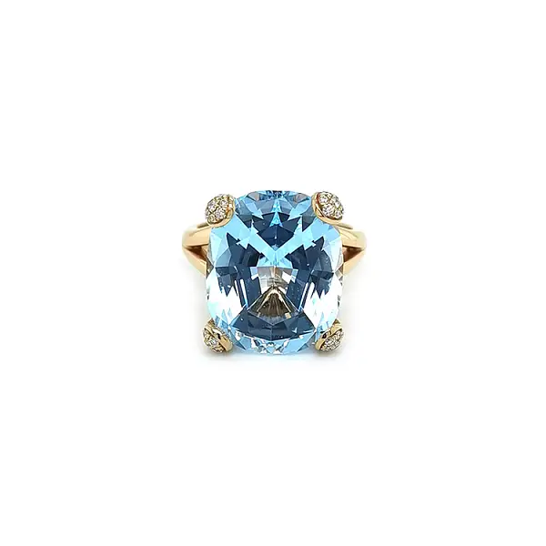 Nhẫn vàng đính đá topaz xanh và kim cương