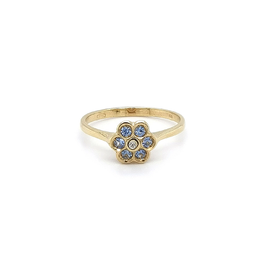 Nhẫn vàng hình hoa với đá topaz xanh