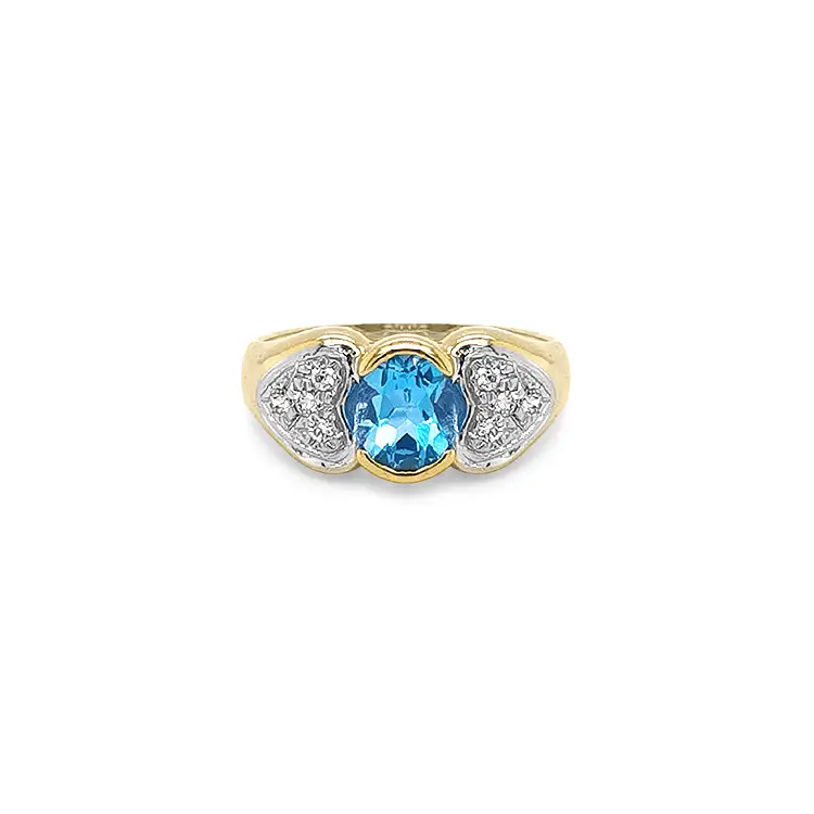 Nhẫn vàng cao cấp gắn topaz xanh và zircon