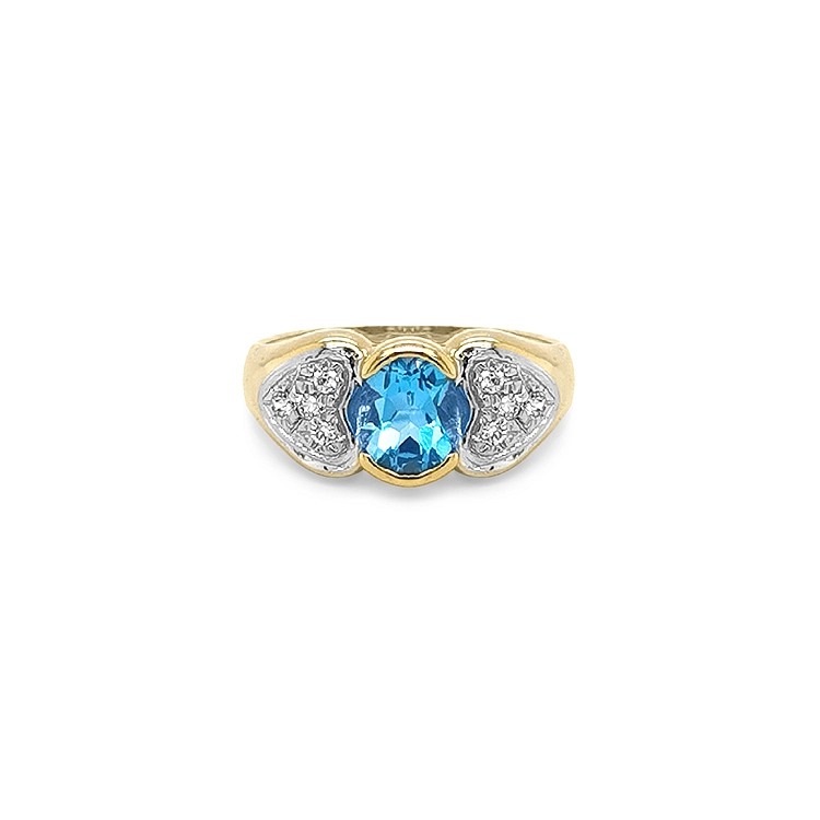 Nhẫn vàng cao cấp gắn topaz xanh và zircon