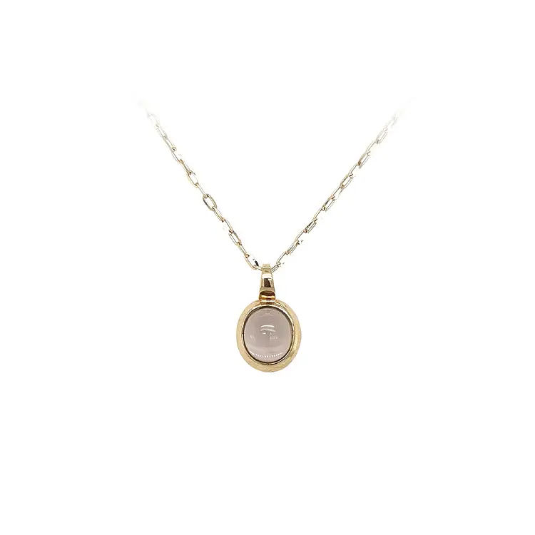 Mặt dây chuyền vàng với đá nâu